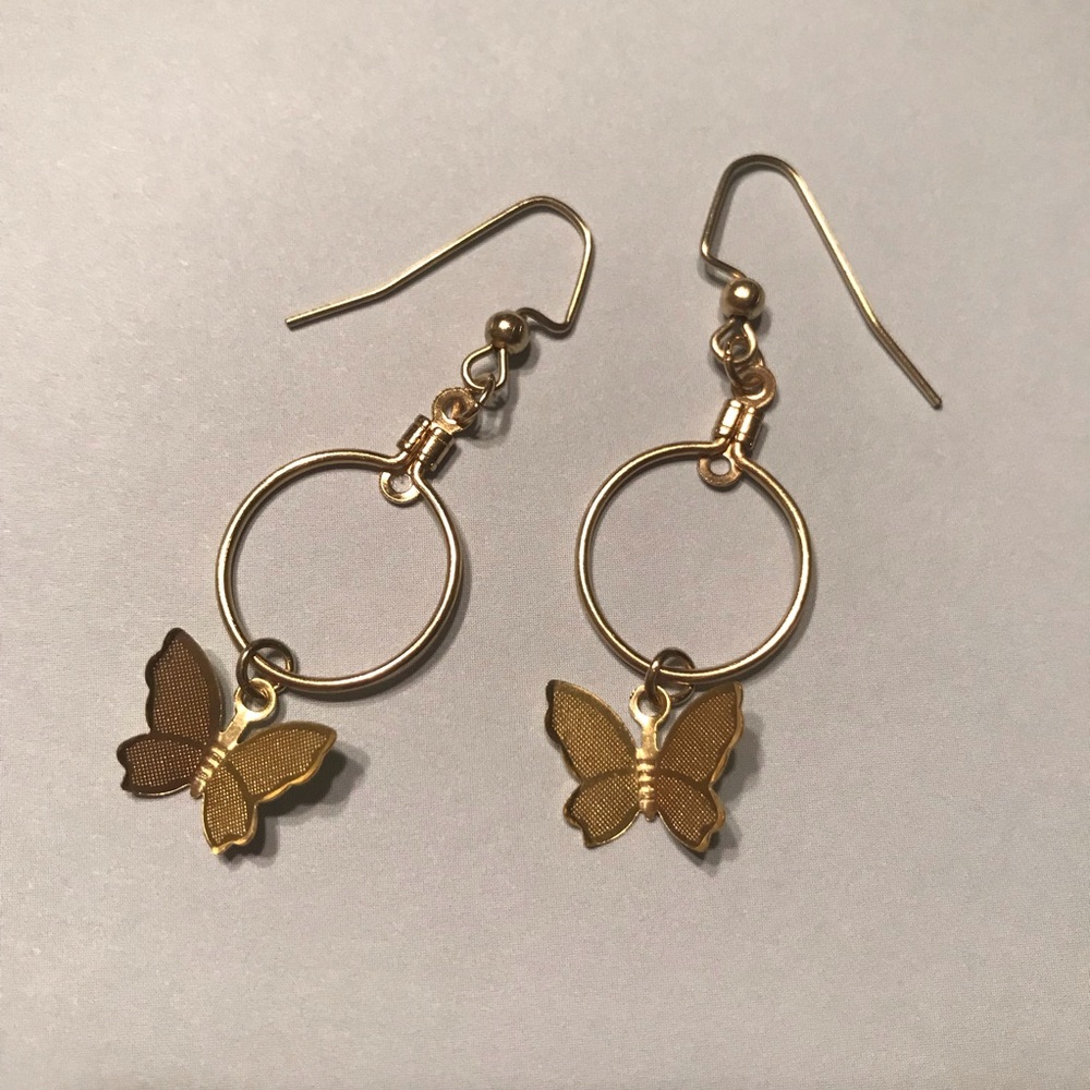 Gold butterfly hoops 💛